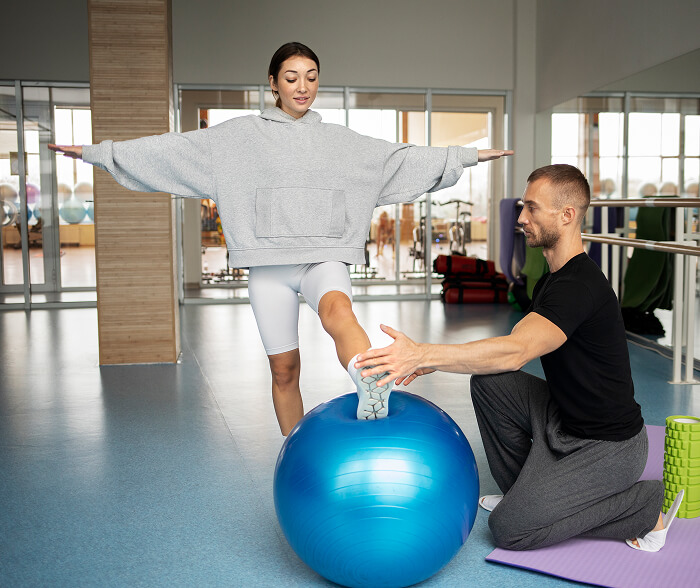 Physical therapist guiding a patient through gait and balance training at Flexify Physical Therapy in Allen, TX to improve stability, coordination, and confidence in movement.